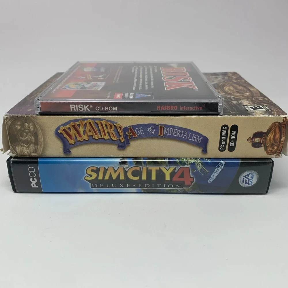 Lot 4 Vintage PC Games CD-ROM: RISK, War, Railroad Tycoon, SimCity 4